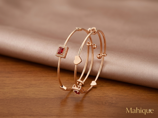 Mahique Rose Gold Plated Ruby Baguette & Heart Motif Adjustable Bangle (Pair of 2)